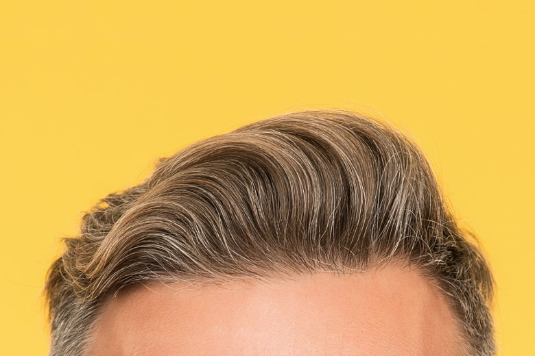A man's gelled-up hairline